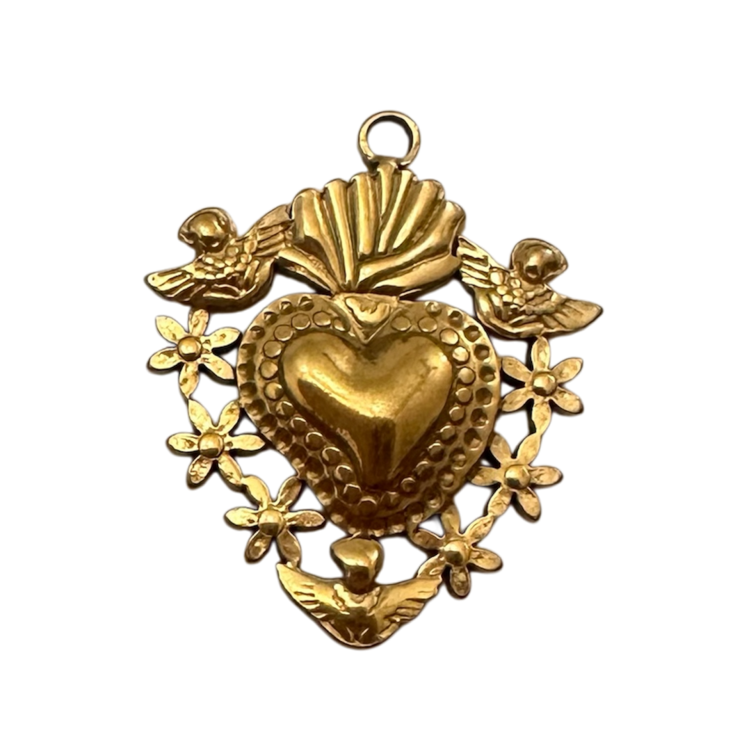 A gold-toned Sacred Heart pendant featuring a central heart motif surrounded by floral and angels details.