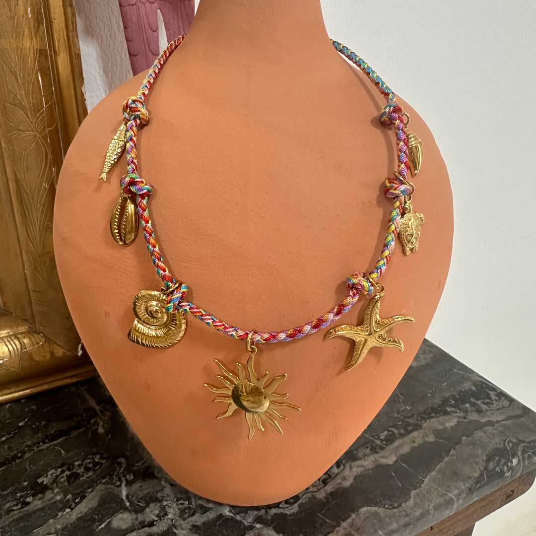 BEACH CHARM ROPE NECKLACE WITH STARFISH, TURTLE & SHELL