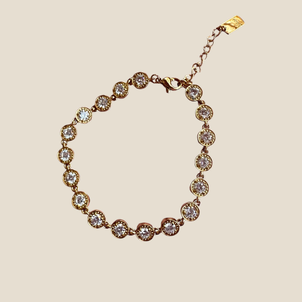 Gold-plated stainless steel tennis bracelet with bezel-set stones