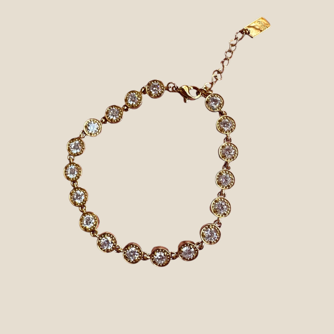 Gold-plated stainless steel tennis bracelet with bezel-set stones