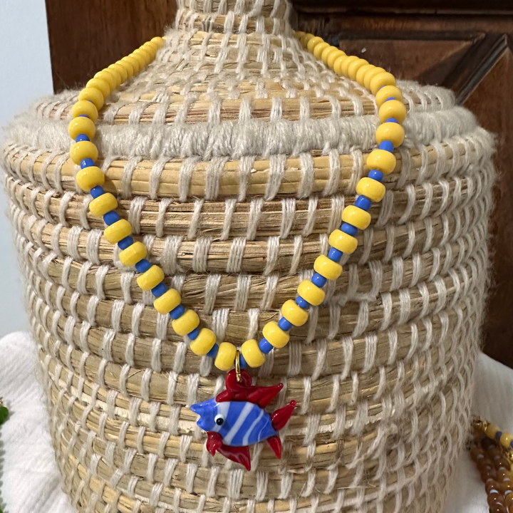 YELLOW & BLUE BEADED NECKLACE WITH GLASS TROPICAL FISH CHARM